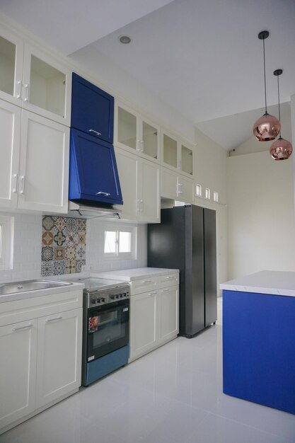 White and blue modern kitchen interior