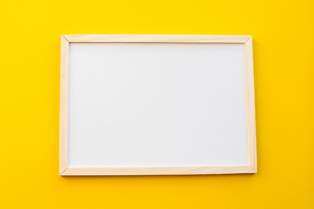 White board on yellow background.