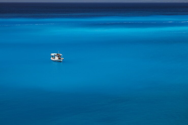 White boat in beautiful sea water.