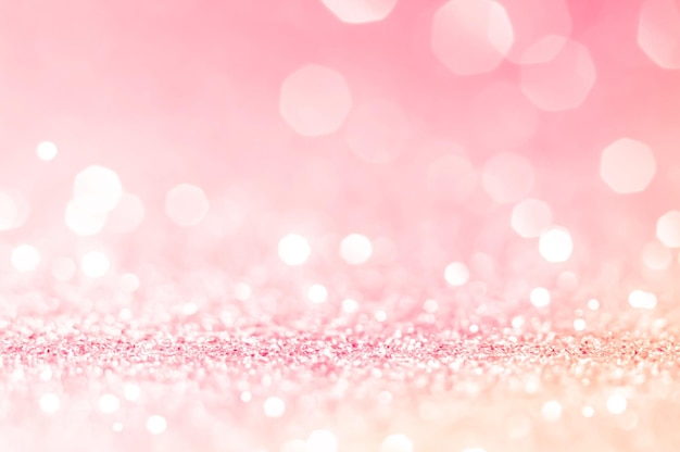 White bokeh lights in pink background