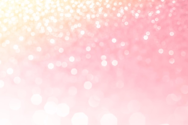 White bokeh lights in pink background