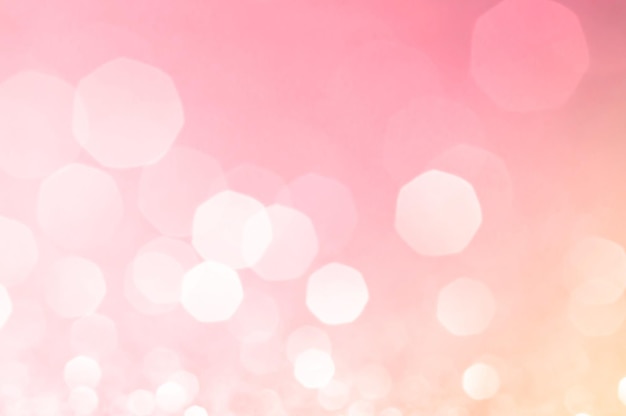 White bokeh lights in pink background