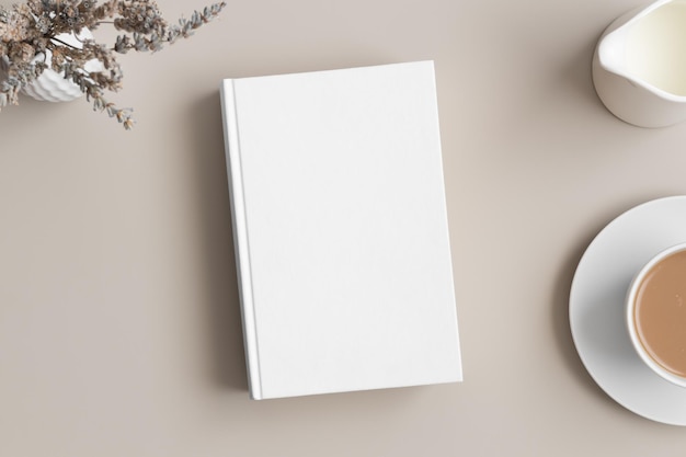 Photo white book mockup with a lavender coffee and a bottle of a milk on a beige table