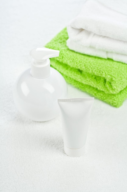 White bottle tube and towels