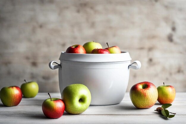 a white bowl of apples and a white container with a handle that says apples