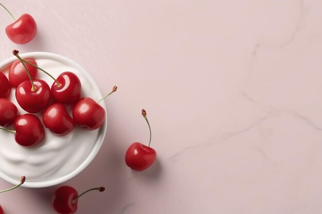 White bowl filled with fresh cherries yogurt on a pink background