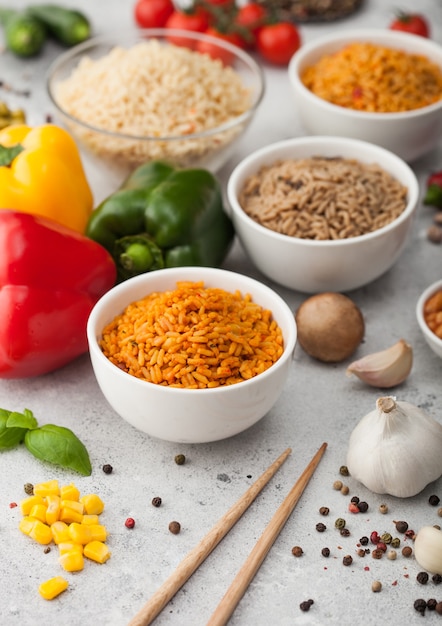 White bowl plates with boiled long grain basmati rice