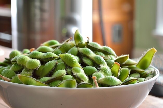 Photo a white bowl with green beans in it and a blurry background