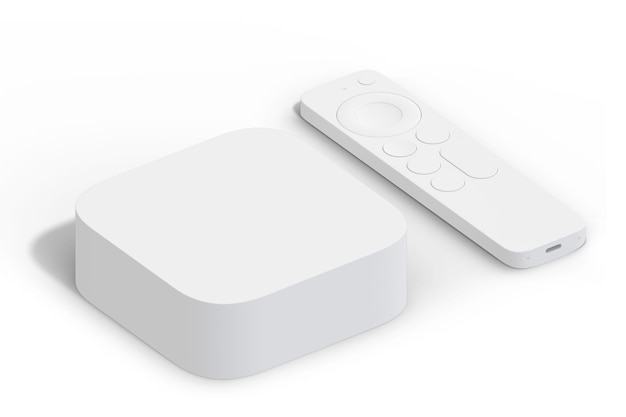 A white box and remote with a white remote on it.