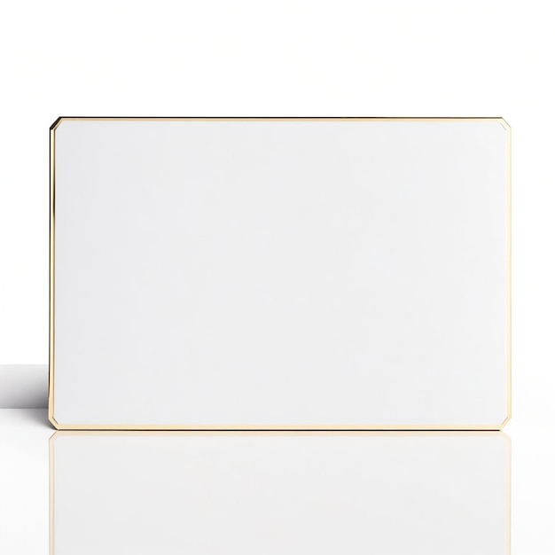 Photo a white box with a gold border sits on a white surface.