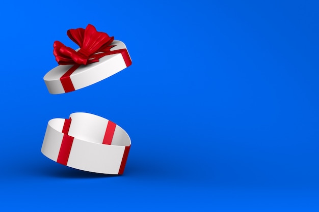 White box with red bow on blue background. Isolated 3D illustration