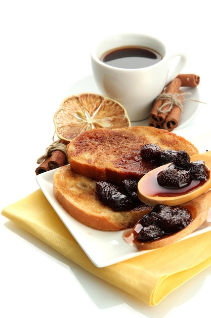 White bread toast with jam and cup of coffee isolated on white