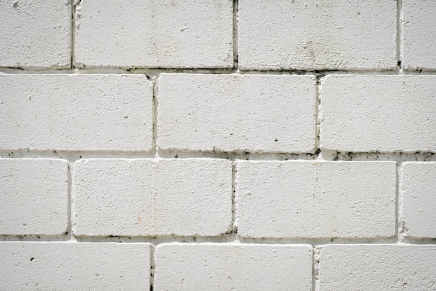 Photo white brick block texture background.