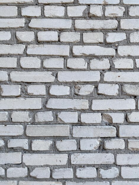 White brick wall background texture relief