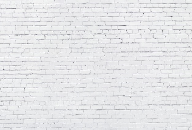 White brick wall background, texture of whitened masonry