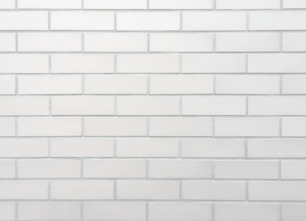 Photo white brick wall background.