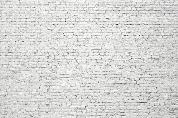 White brick wall, old surface texture of stone blocks