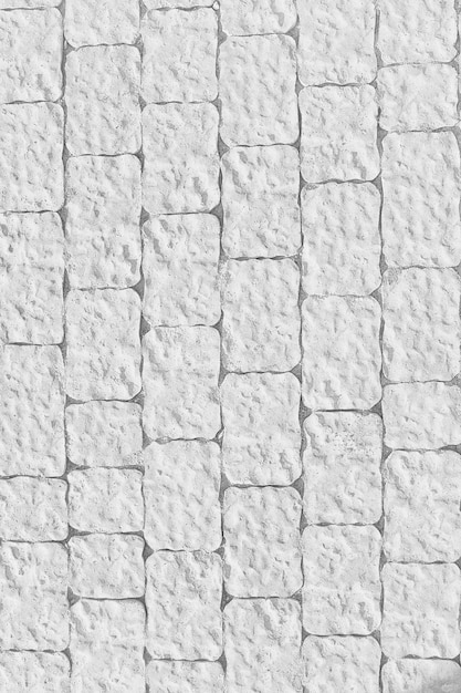 白いレンガの壁のテクスチャ/白い抽象的な背景、ヴィンテージのレンガの壁の建物