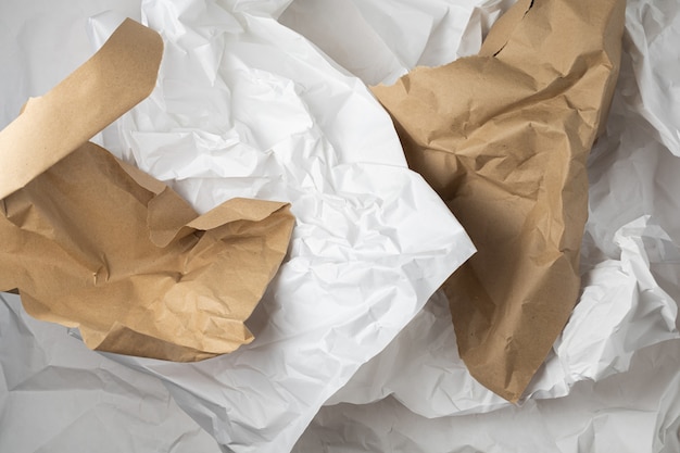 White and brown torn kraft wrinkled wrapping paper background