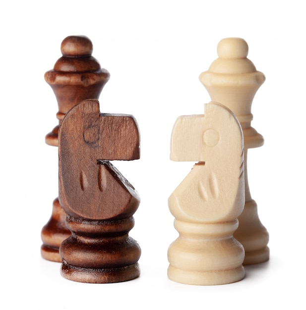 White and brown wooden chess pieces 