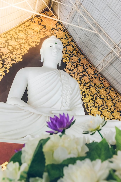 White Buddha image enshrined in the church