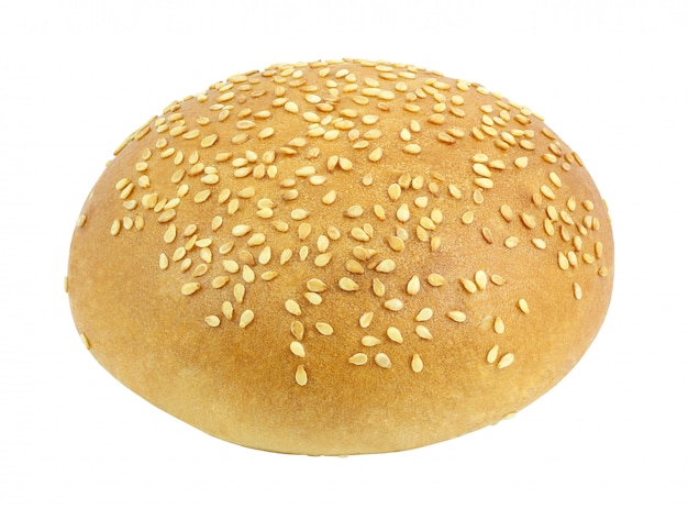 White bun with sesame seeds round whole for a Burger isolated on white background with clipping path. Full depth of field.