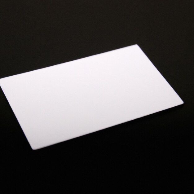 A white business card on a black background