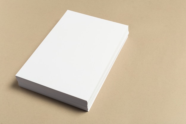 White business card on wooden table. 