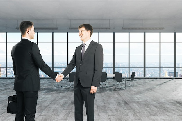 White businessmen shaking hands