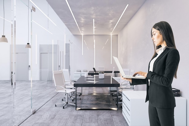 White businesswoman with laptop