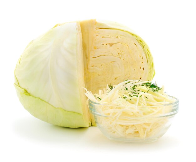 White cabbage and cranberries in a bowl isolated on a white background