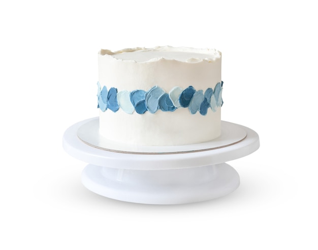 White cake with blue strokes cream isolated on white background