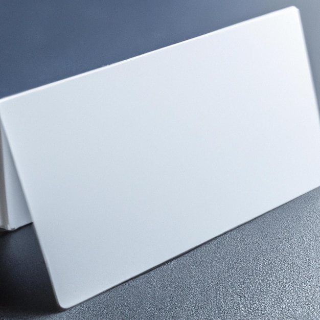 A white card that is on a table