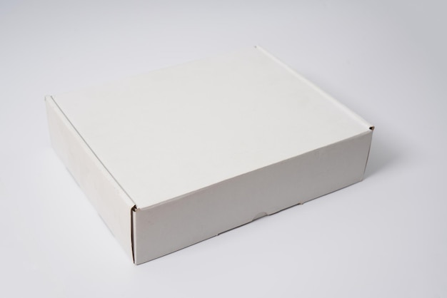 Premium Photo | White cardboard delivery box