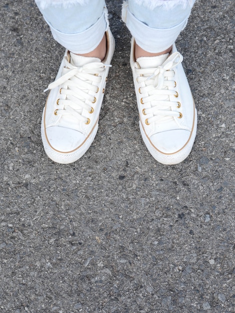 White casual shoes making decision