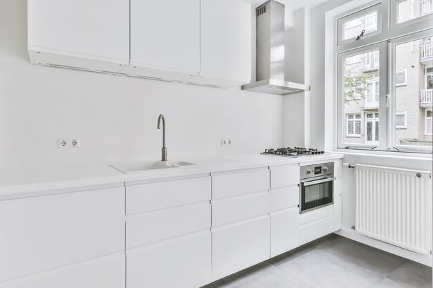 Photo white cat on tiled floor at home