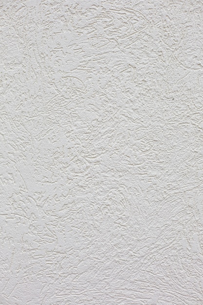 The white cement plaster wall vertical background