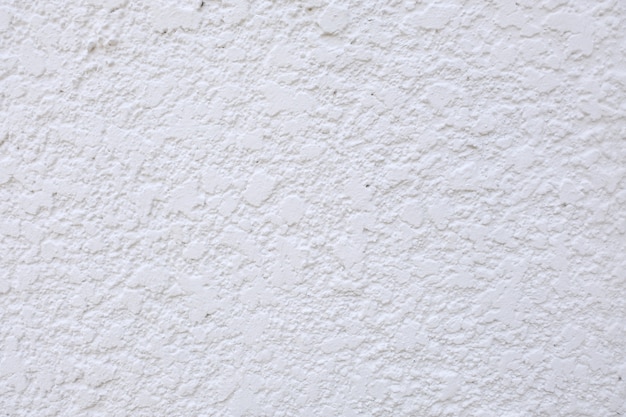 Белая цементная стена