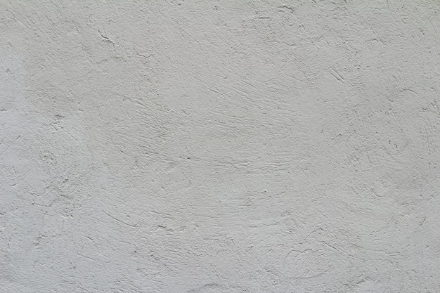 コンクリート材料の背景の白いセメントの壁のテクスチャ。