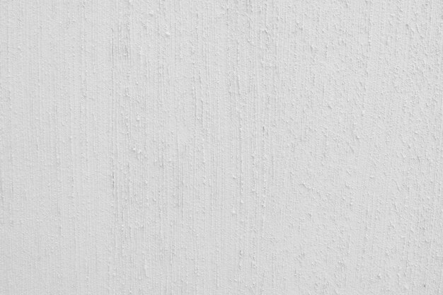 白いセメントの壁の質感と自然な背景のパターン