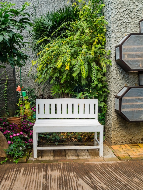 White chair in the garden.