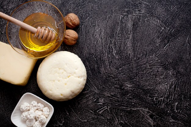 White cheese on a black background