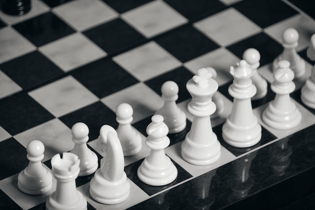 White chess pieces on a chessboard