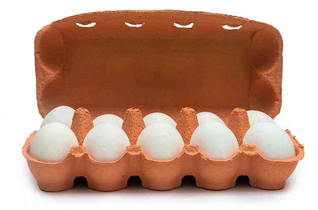 White chicken eggs in a cardboard container for storage and transportation