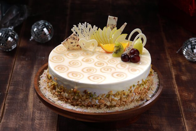 White Chocolate cake arranged on a rustic wooden background