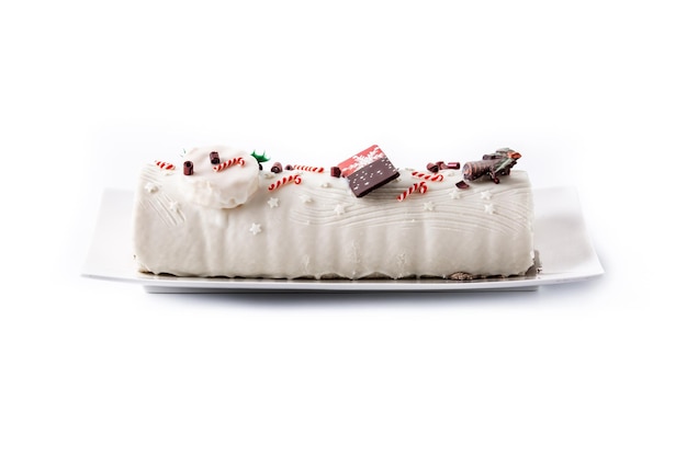 Torta di ceppo di natale al cioccolato bianco con ornamento