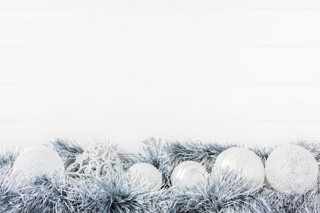 Photo white christmas background with christmas ornaments. , top view