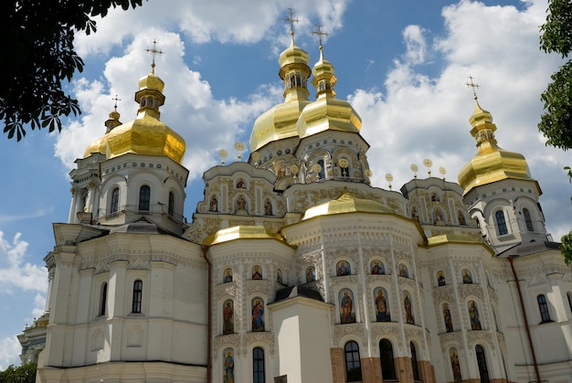 White church with golden domes