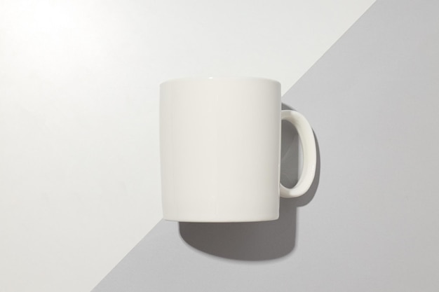White classic cup on a light background