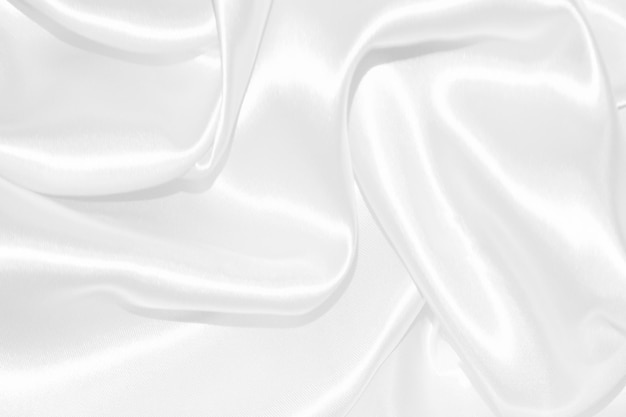 Белая ткань абстрактный фон с мягкими волнами